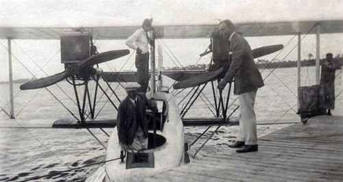 Musick (on dock, to right) as a pilot for Aeromarine