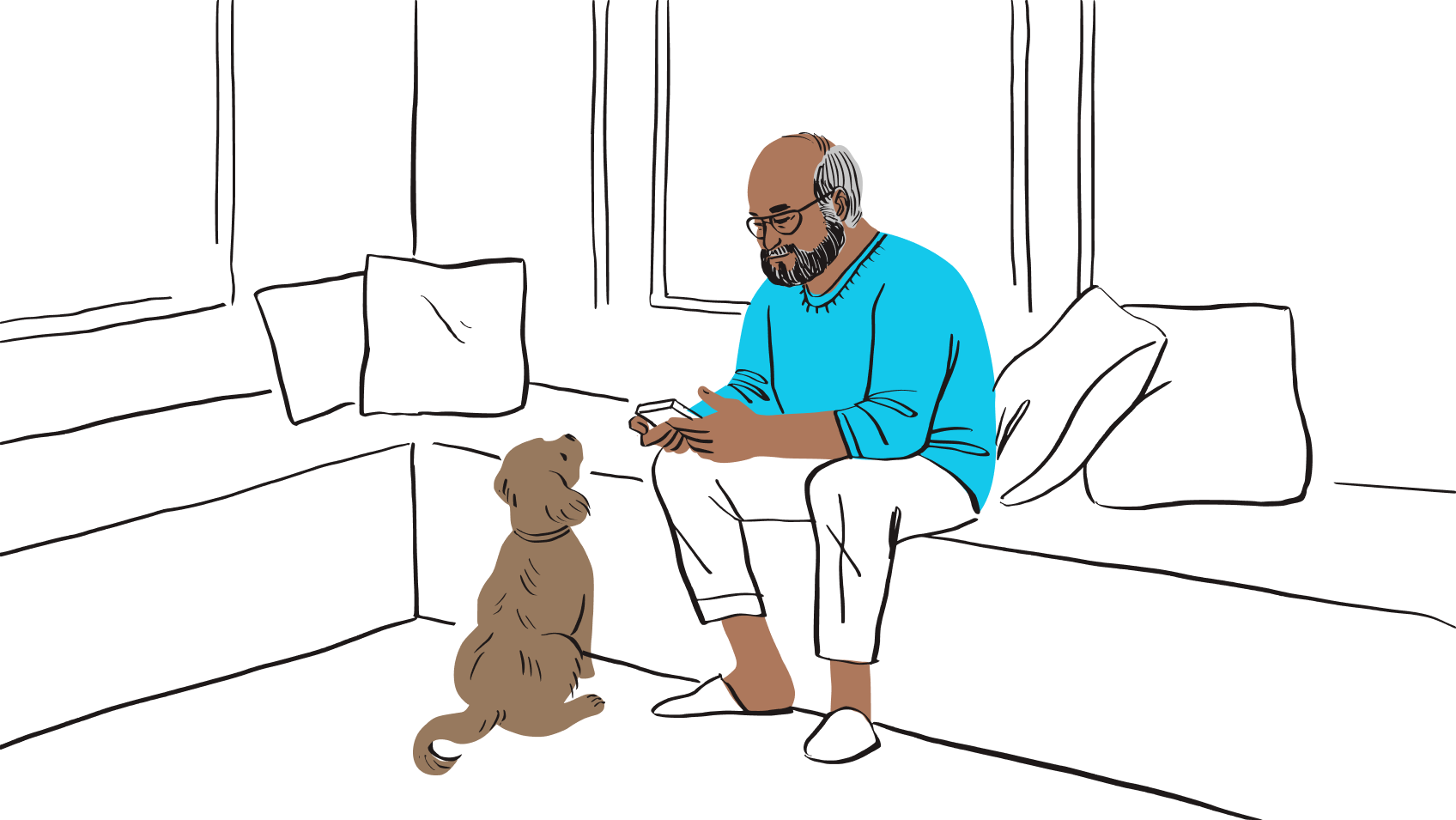 En man sitter på en bänk och tittar på telefonen, med en hund som tittar upp på honom