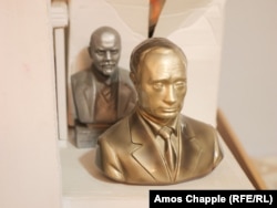 Small busts of Vladimir Putin and Lenin in a storeroom of Comrat's museum.