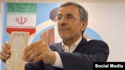 Mahmud Ahmadinejad submits his application in Tehran on June 1.