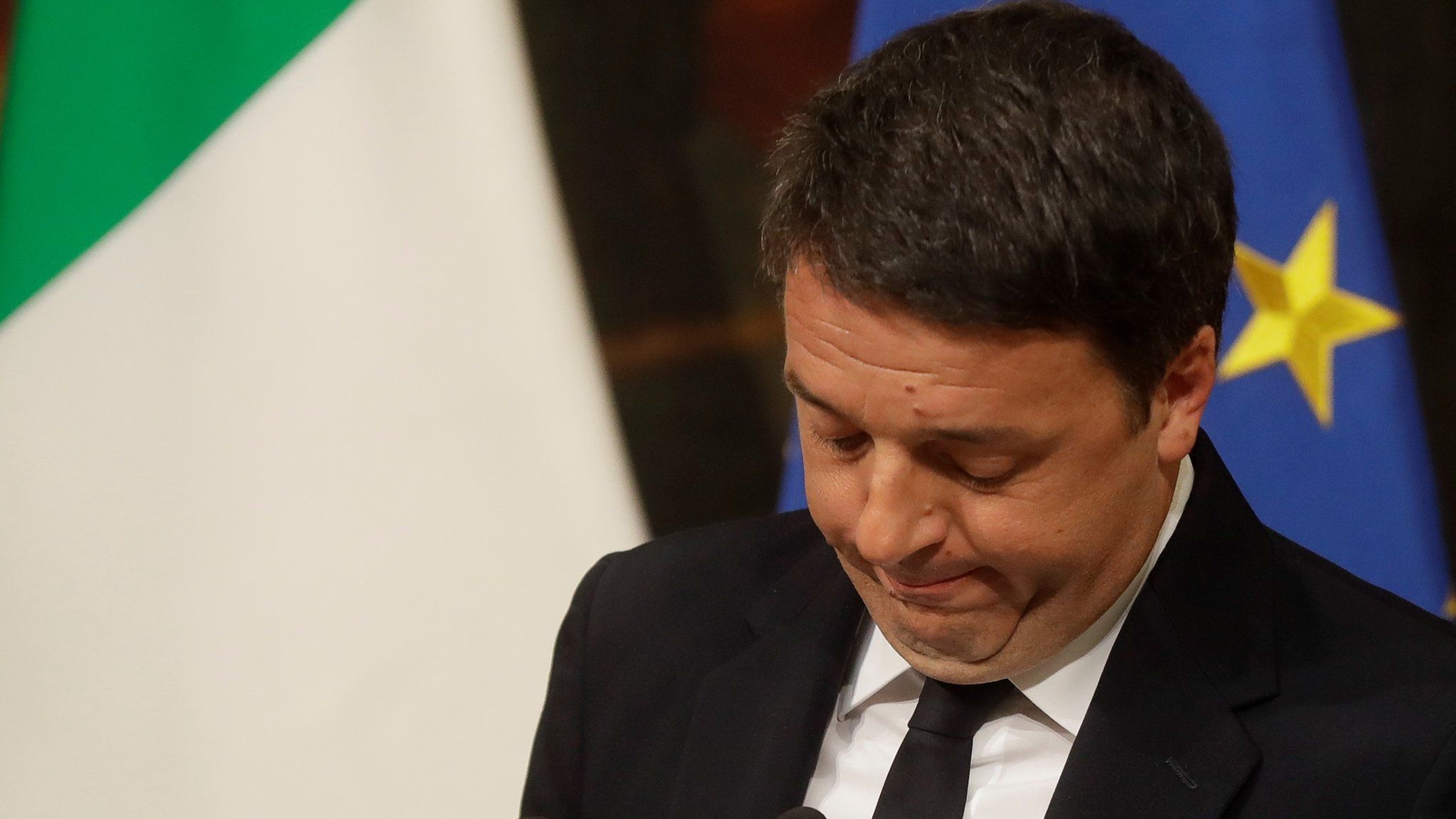 Matteo Renzi speaking at a late-night newsconference on Sunday 4 December 2016