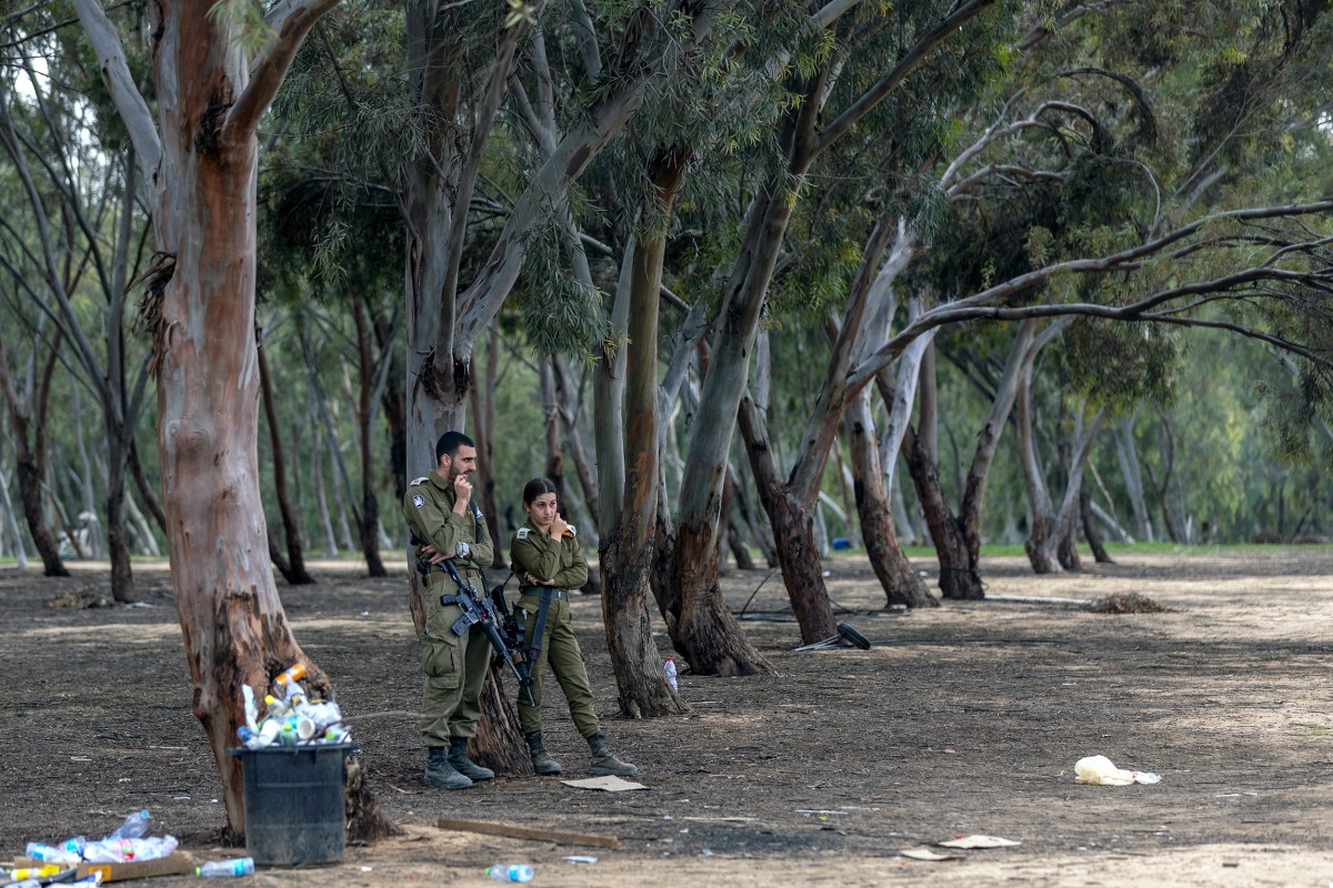 RE'IM, ISRAEL - DECEMBER 21: Israeli solders stand at the 'Nova' festival site, on December 21, 2023 in Re'im, Israel. It has been more than two months since the Oct. 7 attacks by Hamas that prompted Israel's retaliatory air and ground campaign in the Gaza Strip. (Photo by Maja Hitij/Getty Images)